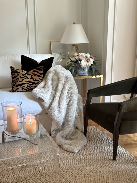 Get cozy with this @donnasalyersfabulousfurs throw blanket!  {#ad} These cool crisp mornings call for coffee and snuggles, and that’s exactly what I’m doing as I type this. Be sure to check them out for more items like throw pillows, rugs, and coats. 
.
#fabulousfurs #fabulousfurspartner 

#LTKhome