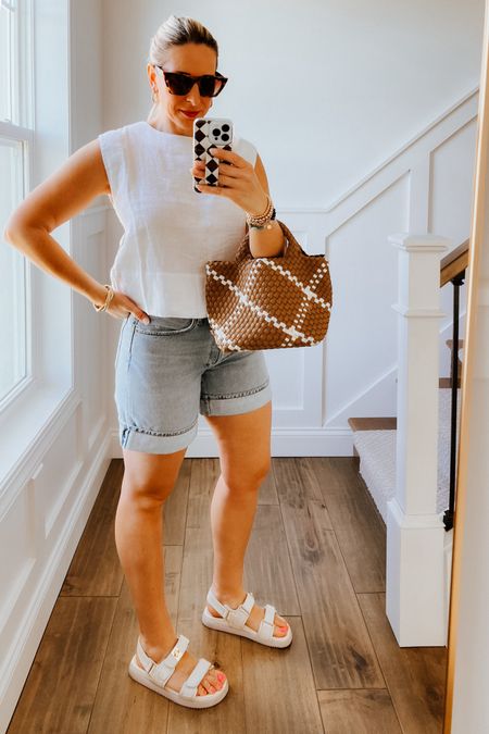 Summer Outfit
AGolde longer denim shorts - wearing true size M. Cuffed (cannot roll down) longer inseam. No stretch. 

Madewell linen top - wearing a small. 

Naghedi St Barths Mini Tote

Steve Madden Dad sandals 

#momstyle #summerstyle #jeanshorts #agolde #denim #nashville 

#LTKstyletip #LTKxMadewell #LTKover40
