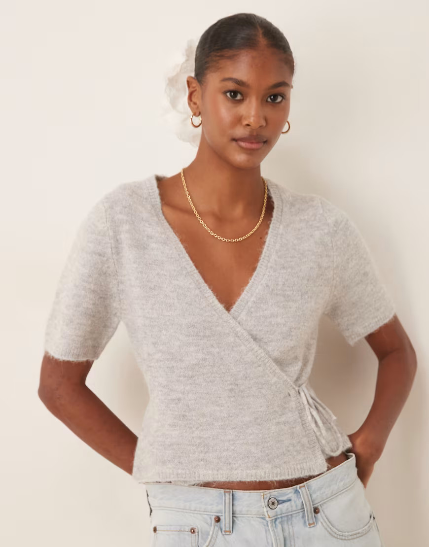 Gina Tricot short sleeve v neck knitted wool alpaca wrap tie front top in light grey melange | ASOS (Global)