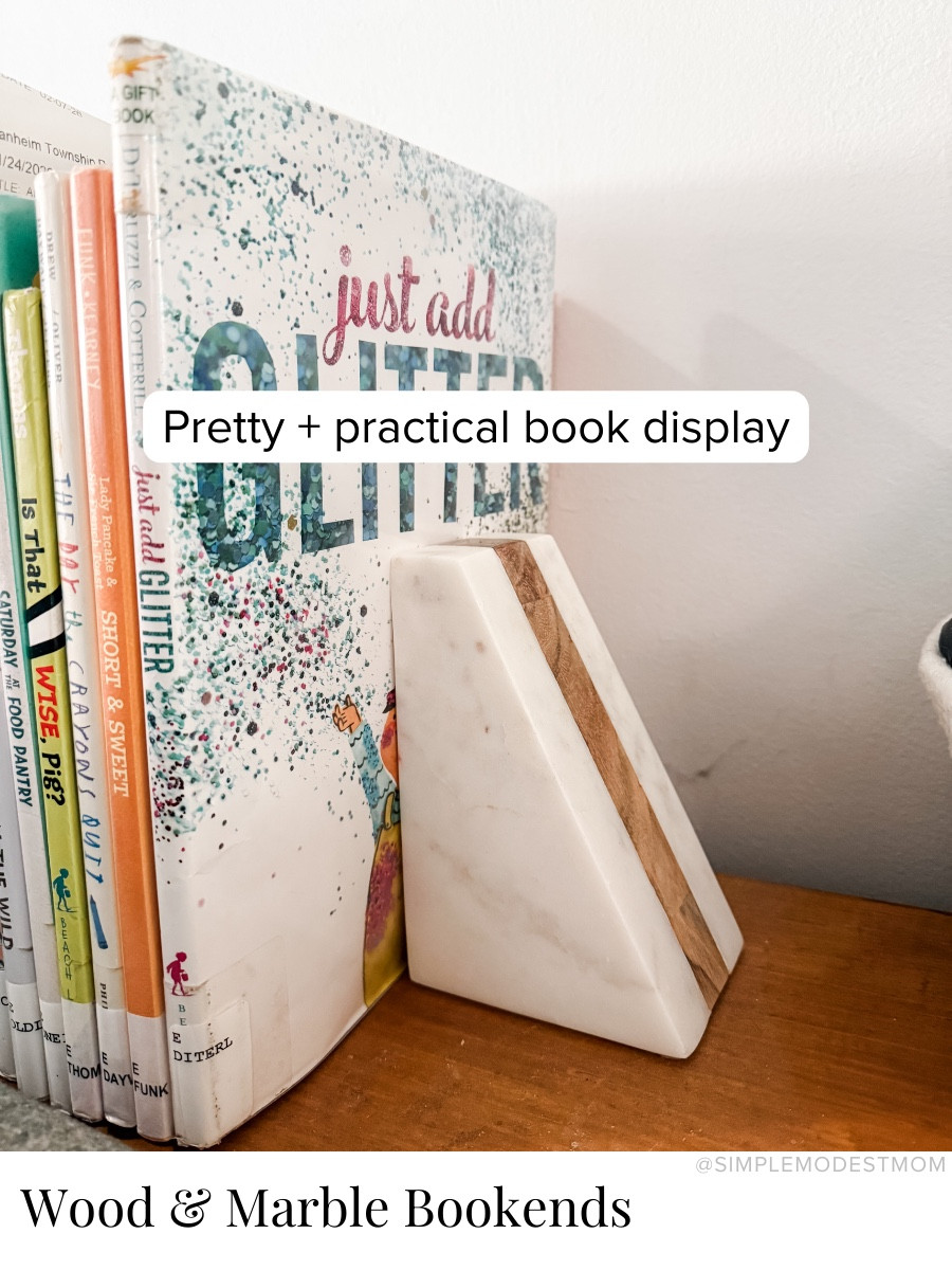 I got this beautiful wood & marble set of bookends for our table behind our couch so that I can set out our library books and keep them within easy reach for everyone in the family. I also plan to set out our seasonal books for the kids.

#LTKHome