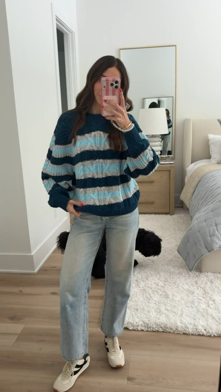 The mix of navy, soft blue, and cream gives this striped sweater a little more personality than a basic neutral knit. The chunky cable texture adds warmth without looking bulky, and the relaxed sleeves balance nicely with straight leg jeans and sneakers for an easy early fall outfit.

Size S sweater 

striped cable knit sweater, blue striped sweater, casual fall outfit, straight leg jeans, sweater and sneakers, transitional style, relaxed fit sweater, weekend outfit, everyday denim look, early fall fashion, annabrstyle

#LTKSeasonal #LTKootd #LTKTravel