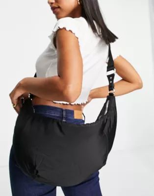 Topshop recycled polyester sling crossbody bag with pouch in black | ASOS (Global)