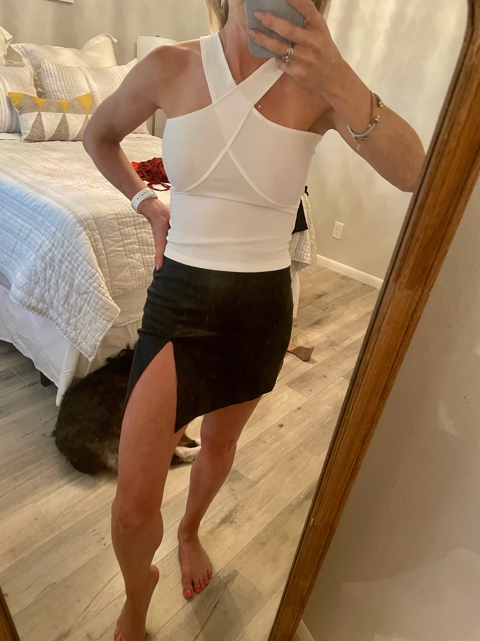 Black skirt 
Leather skirt 
Faux leather skirt 
Halter top 
Forever 21 
Sale 
Vegas outfit 

#LTKstyletip #LTKunder50