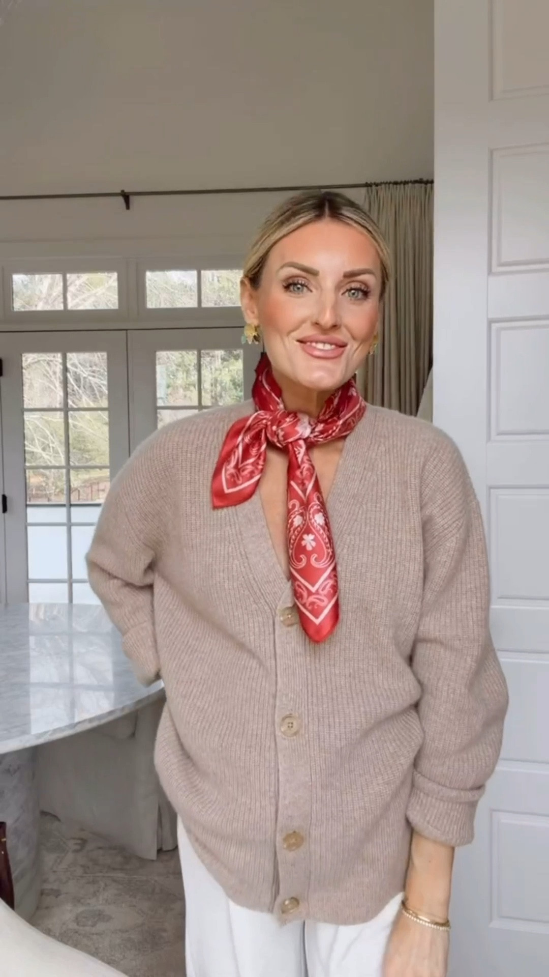 This is a very large scarf, but I tied it in a way that makes it appear much smaller than it is! This red and white one is a fun pop of color to an outfit! 

Loverly Grey, satin scarf, silks scarf, ways to style a scarf