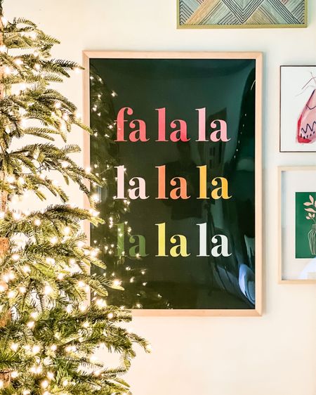 Do you decorate your walls for Christmas? Hanging Christmas art is such a fun and easy way to decorate for the holidays! Our Fa La La print is definitely one of my favorites. It looks amazing in the gallery wall in my bedroom! 
#christmas #christmasart #christmasdecor #christmastree #holidaydecor 

#LTKHoliday #LTKSeasonal #LTKhome