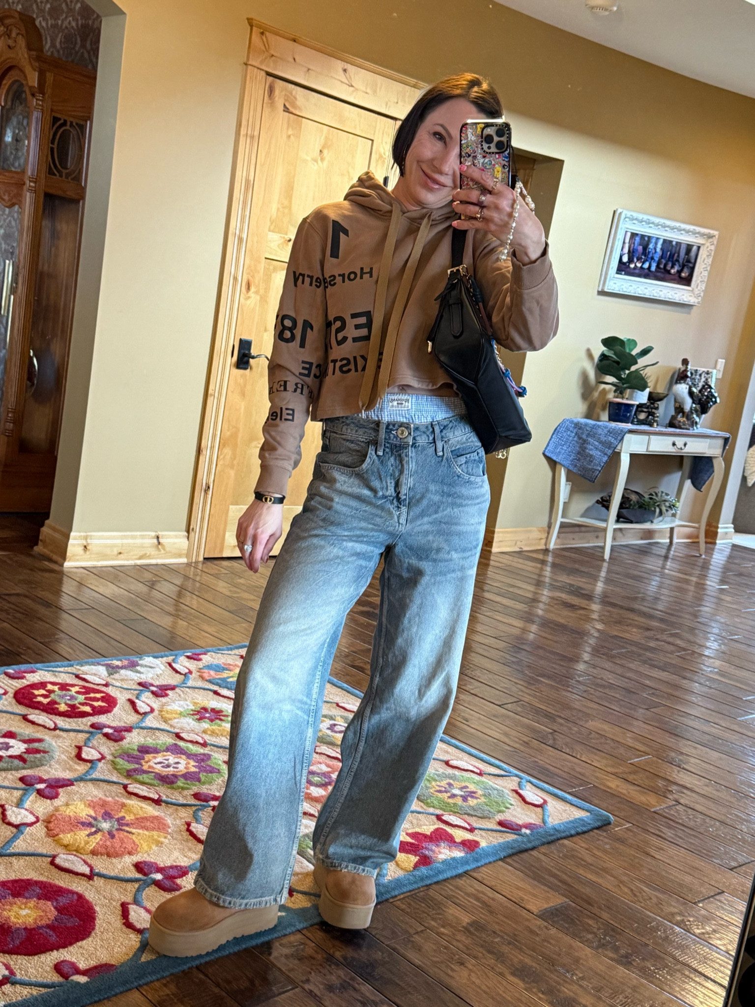 Casual ootd- wide leg jeans, hoodie, platform Uggs and Prada bag. I sized up in pants for length. 

#LTKStyleTip #LTKSeasonal #LTKShoeCrush