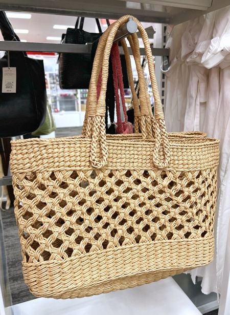Cute straw tote handbag from Target.  The perfect tote bag for spring break or vacation this summer!

Woven tote, Target fashion, Target style, Target handbags 

#LTKfindsunder50 #LTKSeasonal #LTKitbag