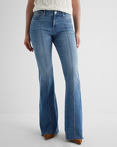 Mid Rise Medium Wash Pintuck Raw Hem FlexX '70s Flare Jeans | Express