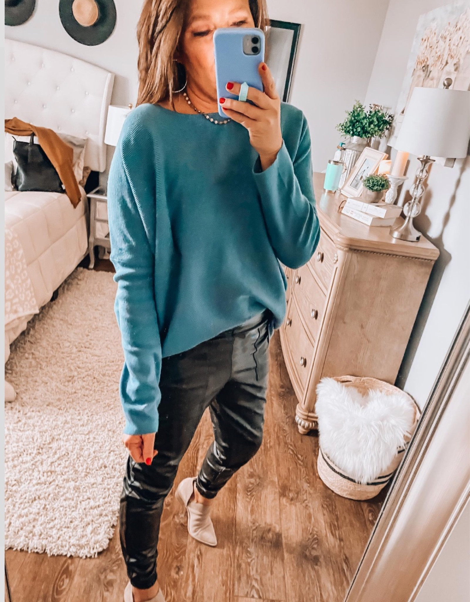 Spanx faux leather joggers are perfect for dressing up or down. Styled with a cute batwing sweater from Amazon. Not fits tts, more colors in the sweater 

Jogger outfit, casual dinner outfit, trends, amazon fashion, amazon finds, sweaters, transition outfit, fashion over 40

#LTKsalealert #LTKstyletip #LTKunder50