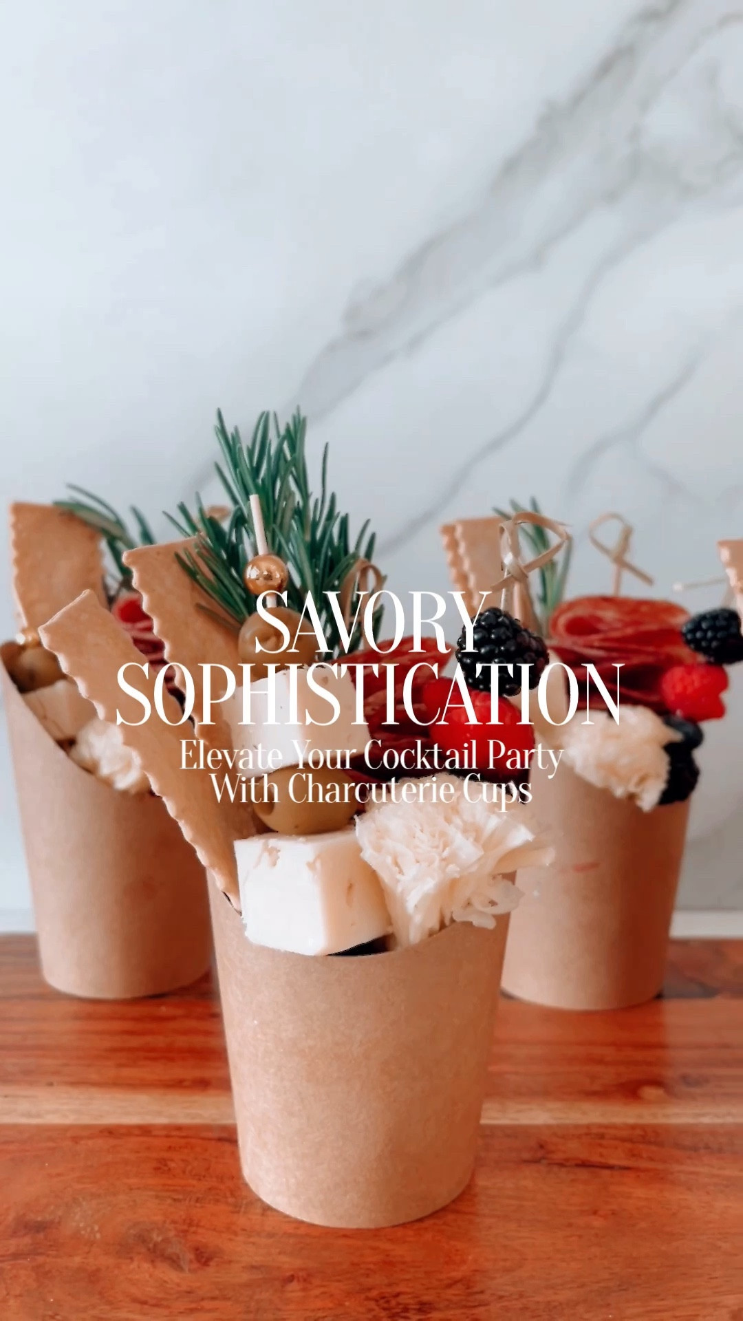 I absolutely adore charcuterie cups! They are not only delicious but also incredibly convenient for any cocktail party where people are mingling and moving around. Recently, I experimented with a new twist on this classic party snack, and it was a hit!
To add some crunch and texture, I placed a handful of walnuts at the bottom of each cup and gourmet crackers. Then, I selected some exquisite Salame Milano from Italy and used it to create lovely skewers. The richness of the salame paired perfectly with the tanginess of the Greek olives, which I alternated with a creamy French herbed cheese. The shaved Swiss cheese rosettes were both super cute and delicious, adding a touch of sophistication to the presentation. To finish off the “masterpiece”, I added some fresh berries and a sprig of rosemary for an organic and fragrant touch.
If you're curious about the cups and skewer picks I used, you can find them on my LKT page. I highly recommend trying out this recipe for your next gathering – it's sure to impress your guests and have them begging for more!