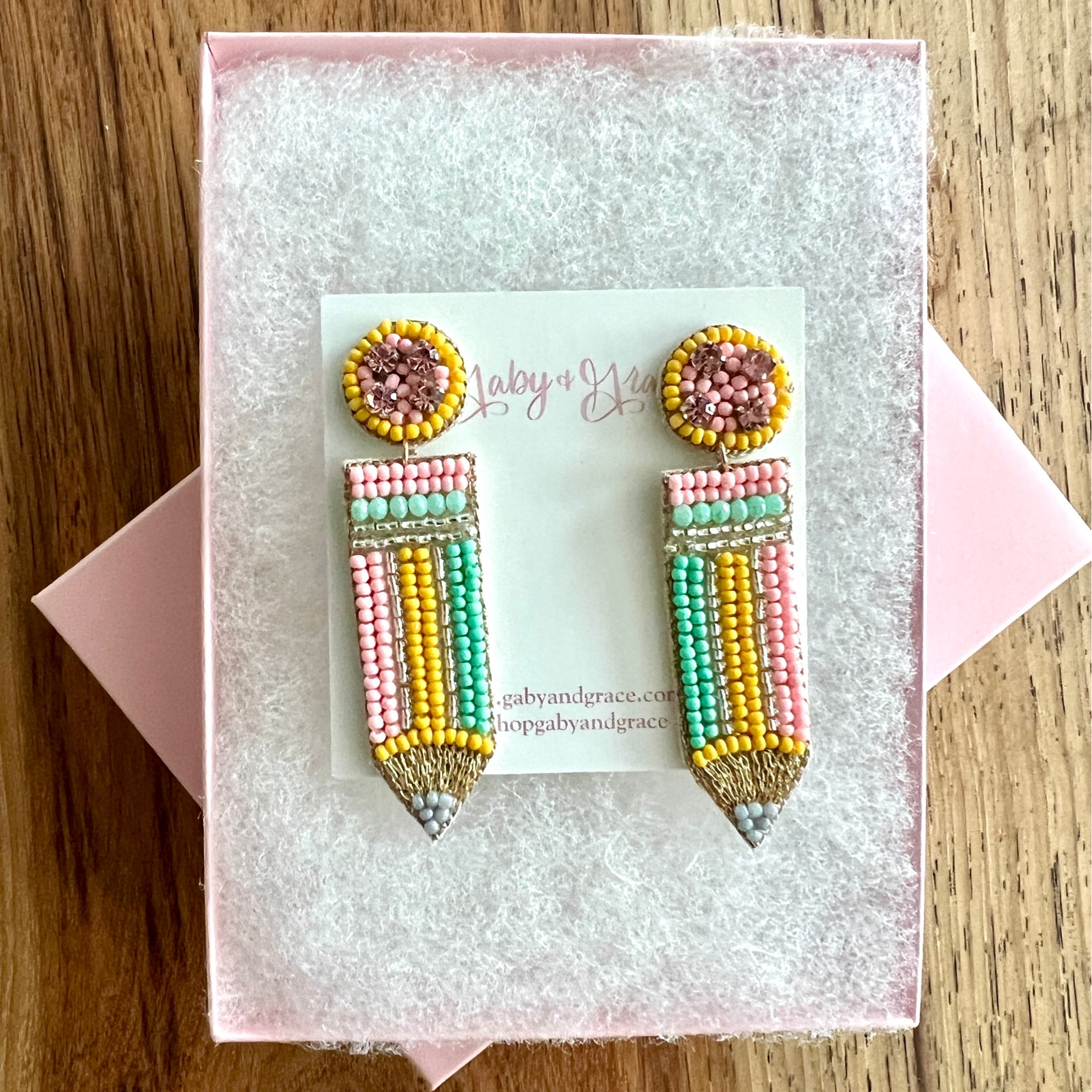 The cutest teacher gift! Beaded pencil earrings in pastel colors.

#LTKfindsunder50 #LTKstyletip #LTKkids