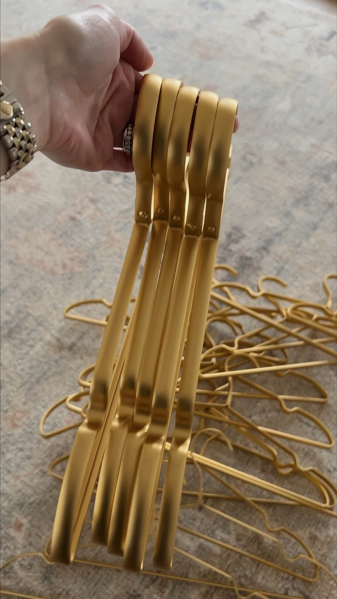 I have these pretty gold hangers in every closet in my home! A very affordable way to elevate the look and feel of a closet!

#LTKHome #LTKSaleAlert #LTKStyleTip