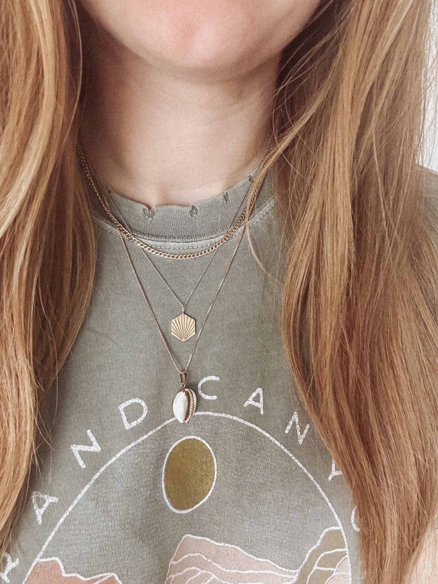 Gold necklace layers. Curb chain, Sarah O tides necklace and a shell necklace with a 20” box chain

#LTKGiftGuide #LTKfindsunder100