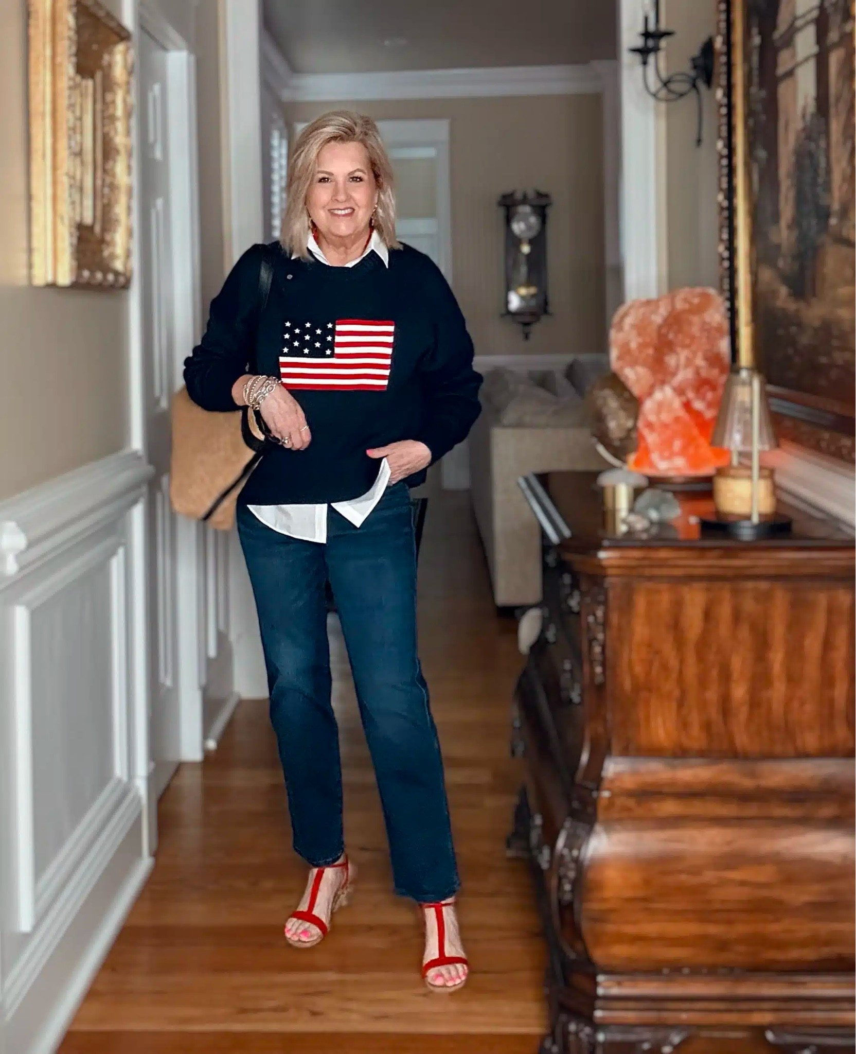 Memorial Day outfit idea! This patriotic sweater will be great for year round and would also look good with shorts or over the shoulders of a dress. My white shirt and sweater are a size medium and jeans are a size 8.

#LTKOver40 #LTKootd #LTKSeasonal