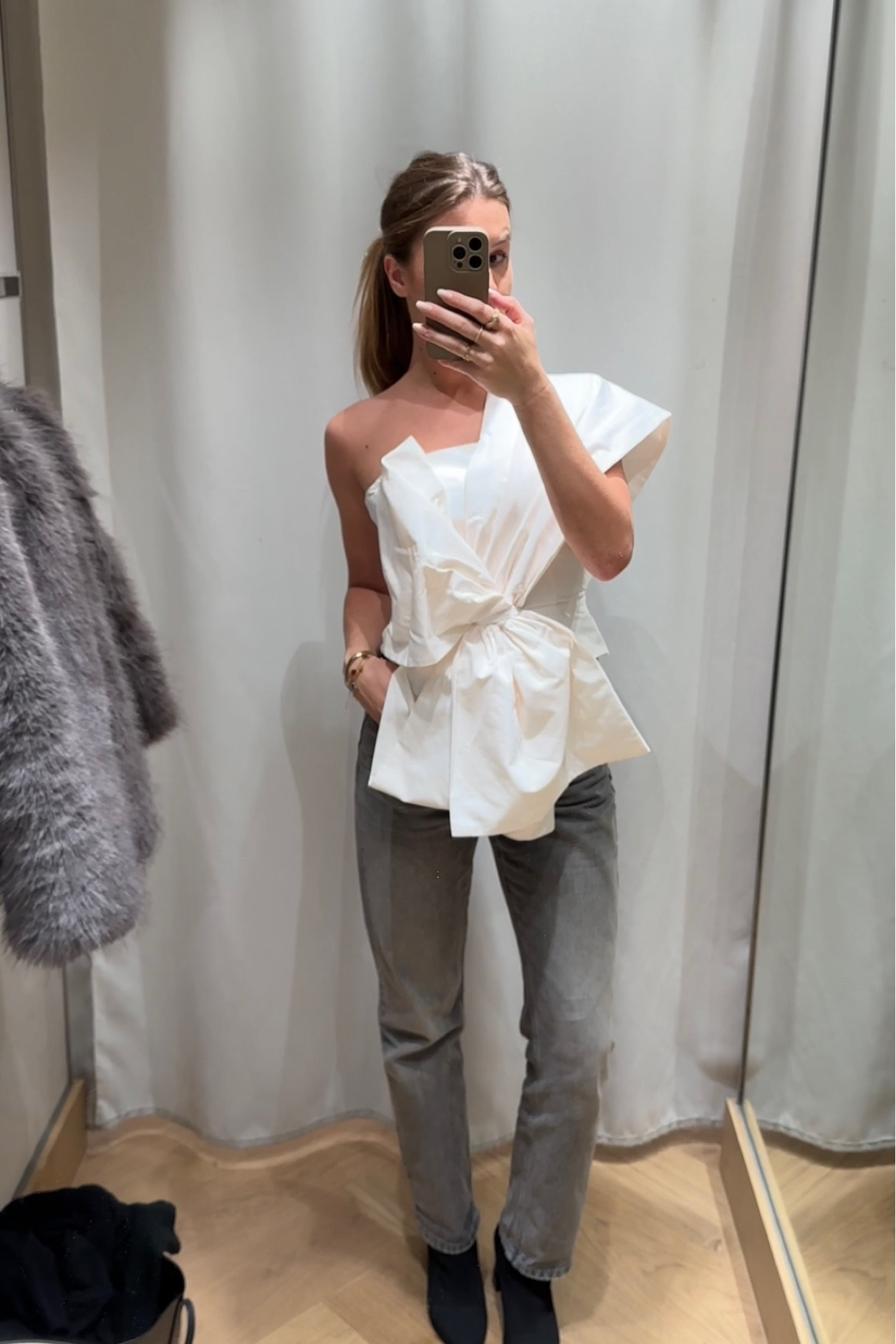 Christmas top with big bow and one shoulder. Christmas party outfit. 

#LTKSeasonal #LTKparties #LTKHoliday