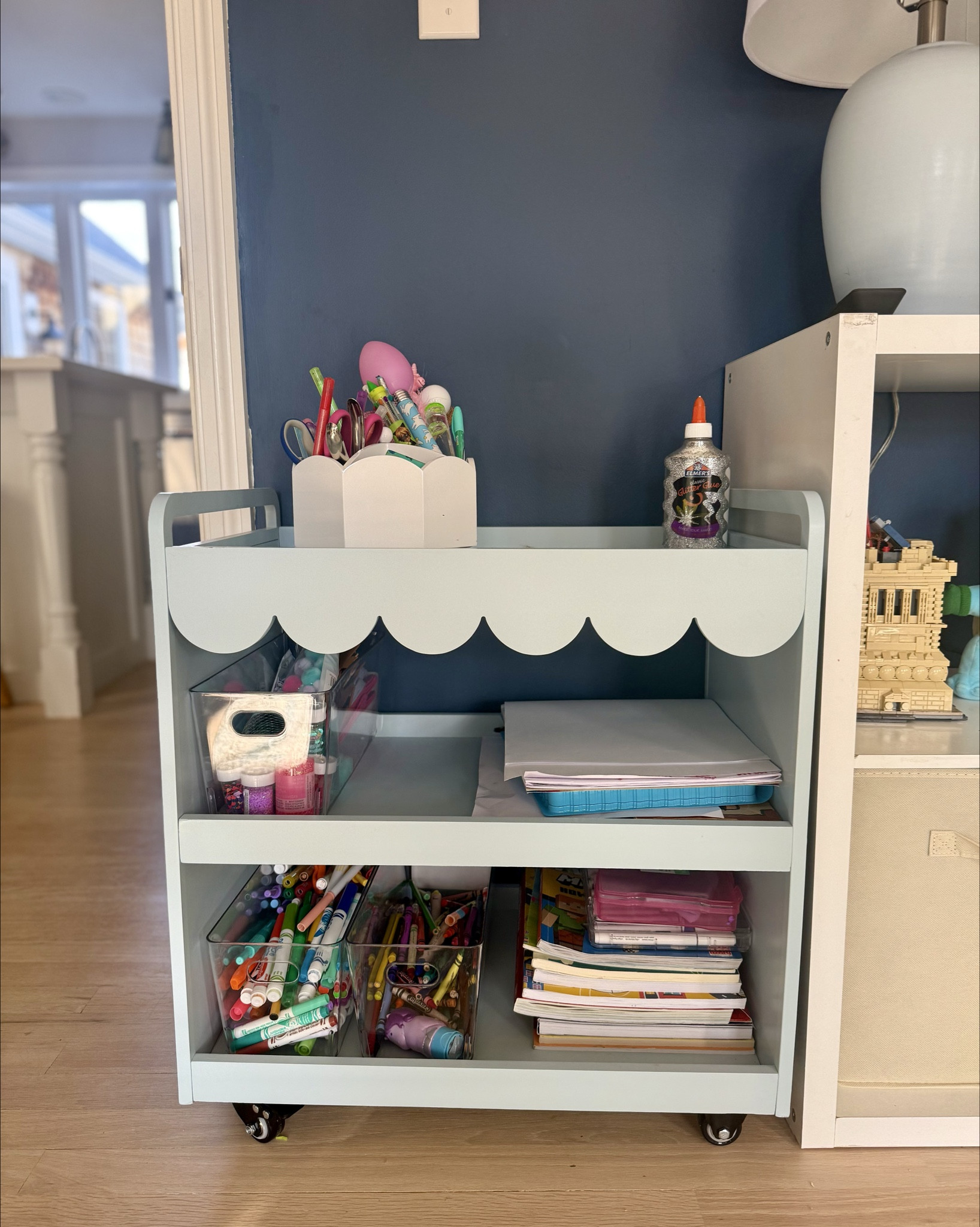 Just got this adorable art cart for our kids playroom. It’s the perfect size, it has wheels and a chalkboard in the side!