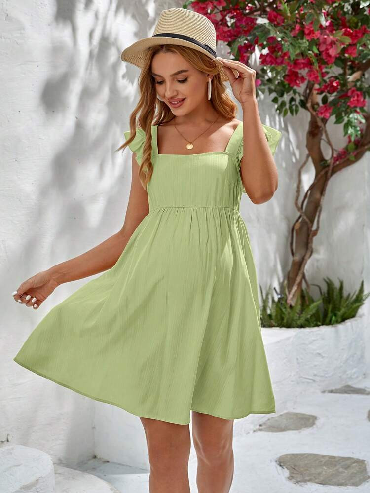 SHEIN maternidade Vestido sólido acabamento de babados
       
              
              R$74... | SHEIN