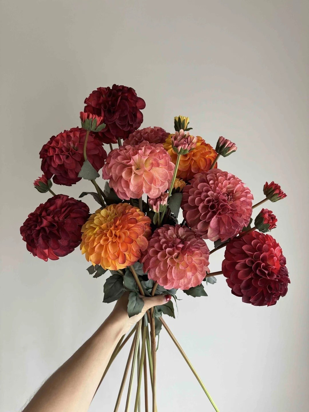 These Faux Dahlia Flowers by KissMyPampas are almost too real to believe 🌸✨ With beautifully detailed petals and a full 11 cm bloom, each stem stands 75 cm tall for effortless styling in tall vases—or simply bend the base for smaller arrangements. Available in Pink, Orange, Red, and White/Cream, they’re perfect for mixing colors or making a bold statement with a single hue. (Heads up: Orange has a 2-week dispatch time.)

#LTKhome #LTKdecor #FauxFlowers #DahliaDecor #HomeStyling #EtsyFinds #InteriorInspo #StatementFlorals

#LTKWedding #LTKHome #LTKSeasonal