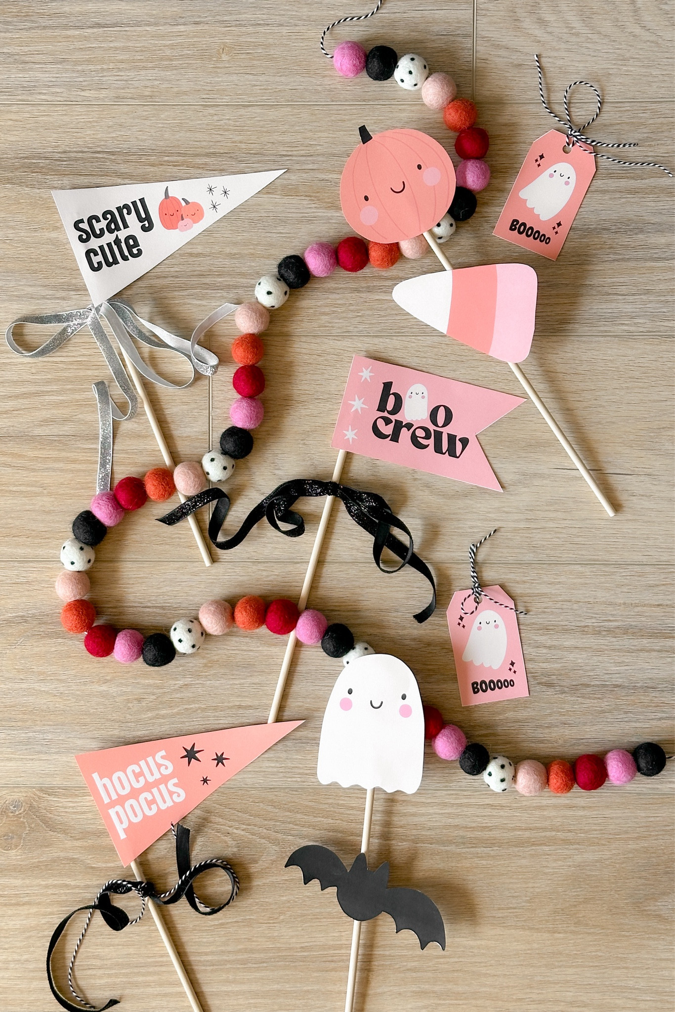 Boo basket flags and felt ball garland! Download my free printable Halloween tags and flags at CaitlinMarieDesign.com 👻 

#LTKKids #LTKParties #LTKHome