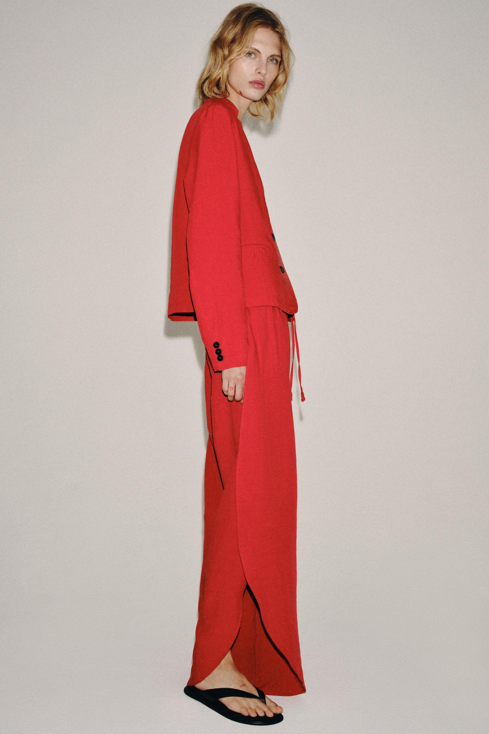 ZARA WOMAN COLLECTIONTrousers made from a yarn with a 25% linen blend. Featuring a mid-waist and ... | Zara UK
