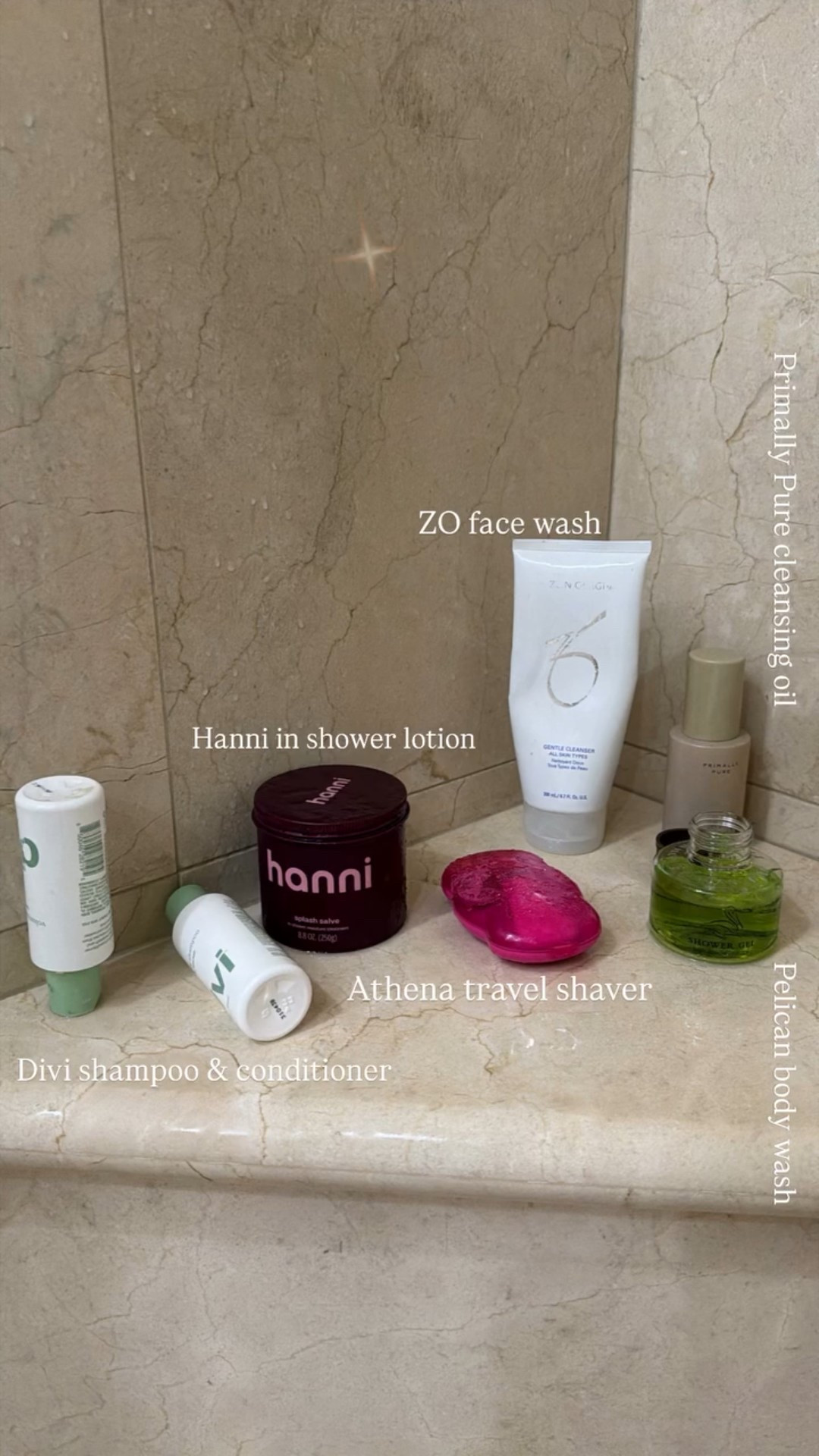 Athena travel shaver Divi shampoo & conditioner Hanni in shower lotion Primally Pure cleansing oil ZO face wash Shower favs Pelican body wash
