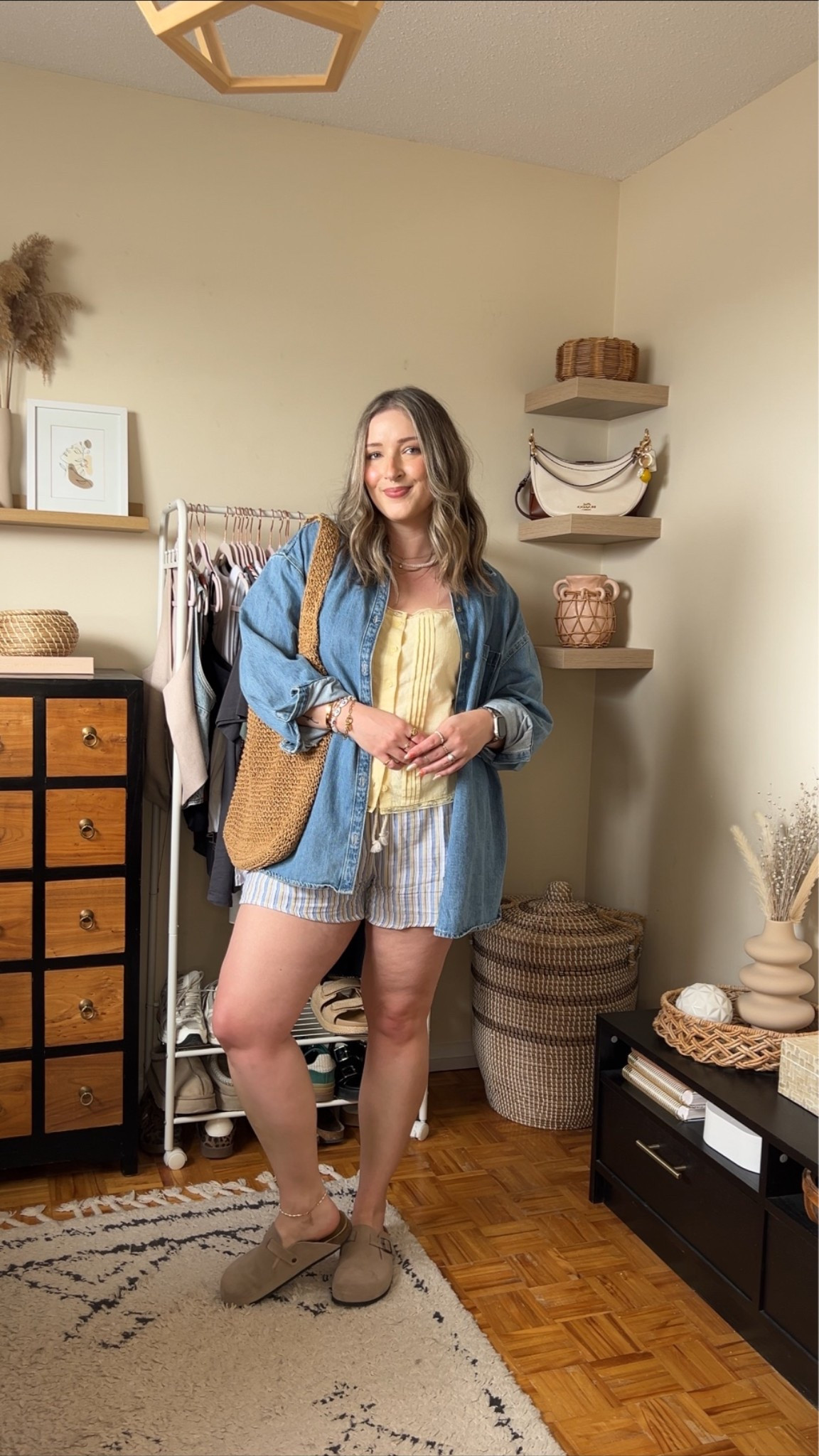 Easy summer outfit! Canadian links are under “similar products”. Wearing my usual size L in the striped shorts, butter yellow tank top, and oversized denim shirt. Straw tote bag is one of my fave Amazon finds! Linked similar clogs

#LTKsummer #LTKsale #LTKmidsize