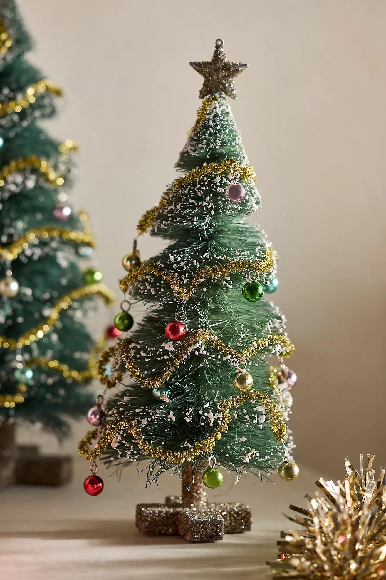 Flocked Garland Brush Tree | Anthropologie (US)