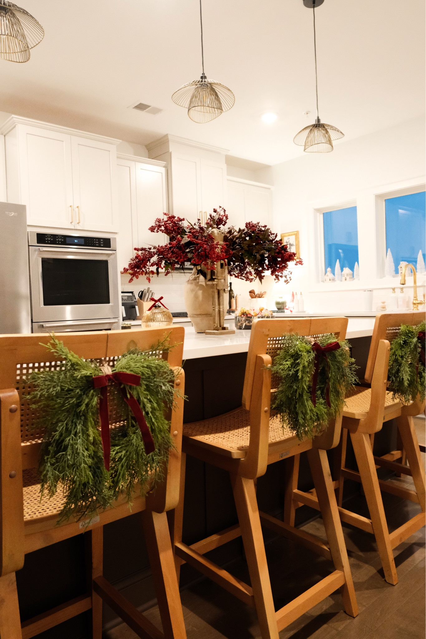 Bar stools in I wreath and kitchen island Christmas decor 

#LTKHoliday #LTKSeasonal #LTKHome