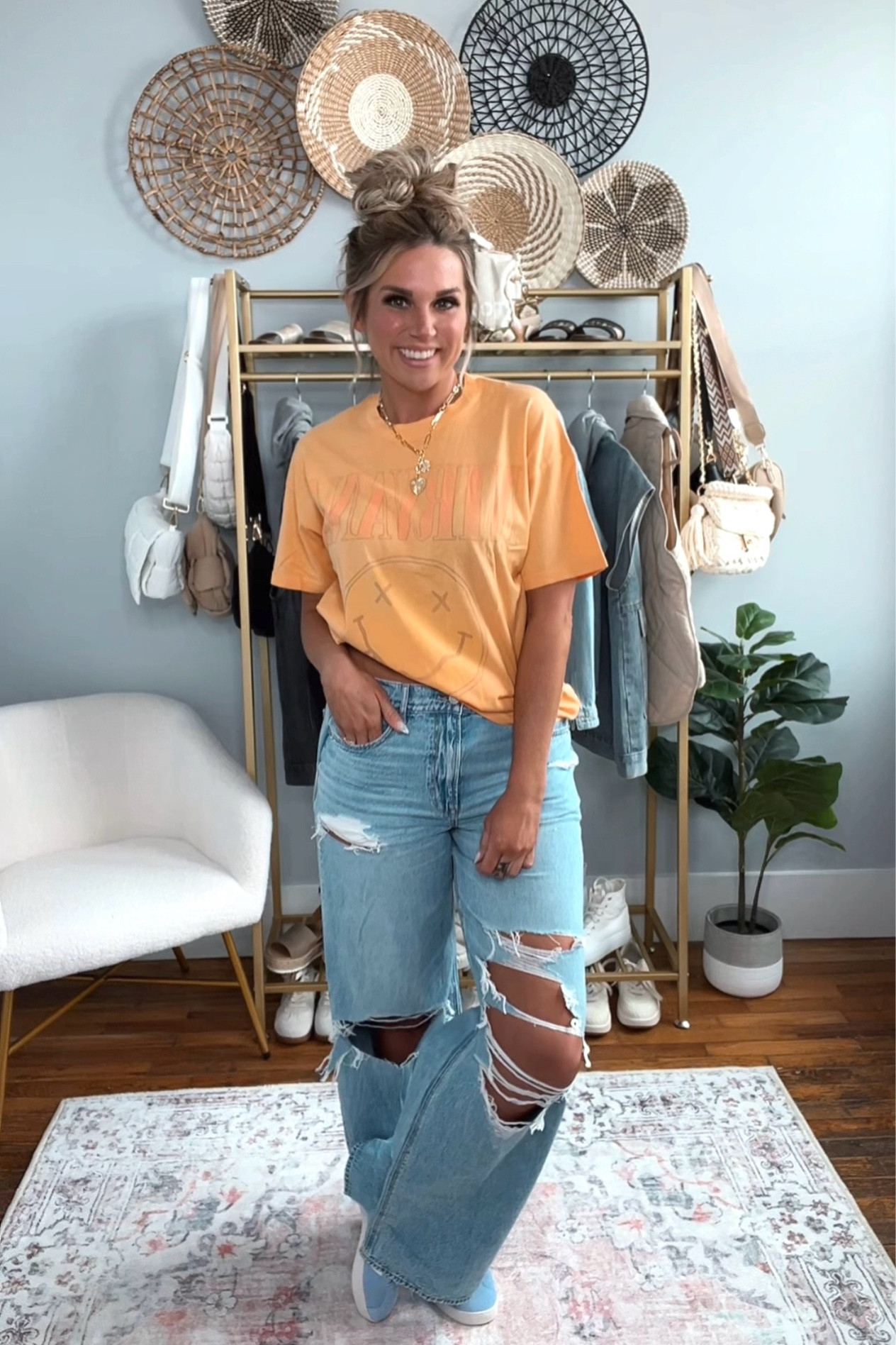 Orange oversized Nirvana graphic tshirt with AE drape super high waisted distressed jeans. Love this look for spring - easily recreate with an oversized tee, wide leg jeans, and sneakers for a cozy but stylish mom outfit! Spring outfit inspo, comfy outfit, cozy outfit inspo

#LTKstyletip #LTKsalealert #LTKSeasonal