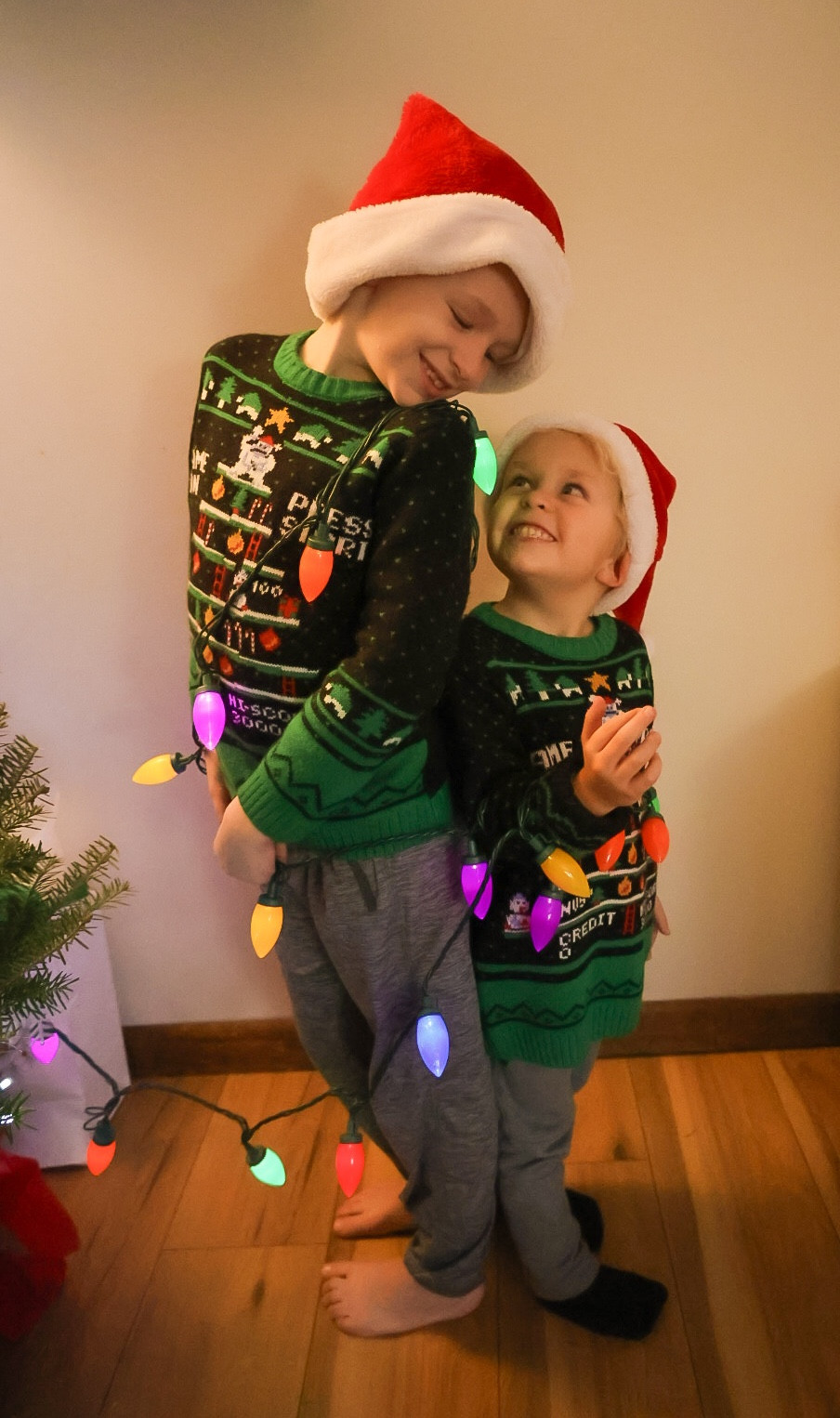 Sibling Christmas pictures 
Sibling Christmas photo 
Kids Christmas picture 
Kids Christmas sweater 
Kids Christmas outfit 

#LTKstyletip #LTKHoliday #LTKkids