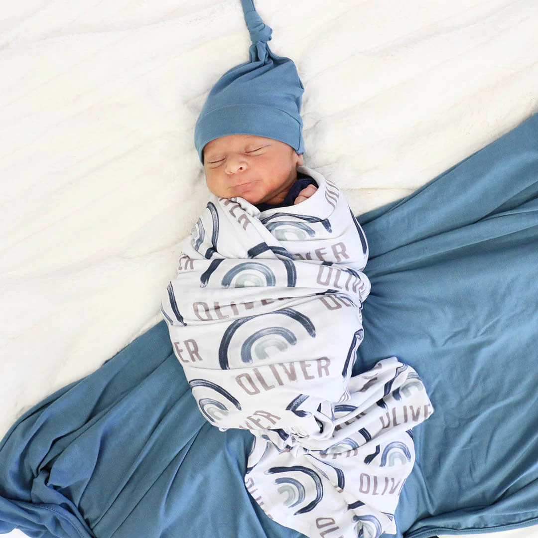 Brooks' Blue Rainbow Personalized Swaddle Blanket | Caden Lane