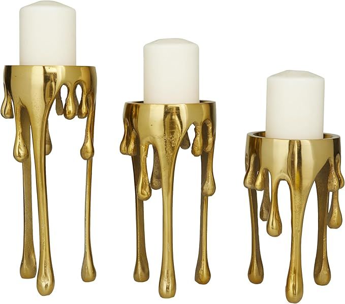 CosmoLiving by Cosmopolitan Aluminum Metal Abstract Decorative Candle Holder Melting Drip Candle Stand, Set of 3 Candlestick Holder 12", 10", 8"H, Gold | Amazon (US)