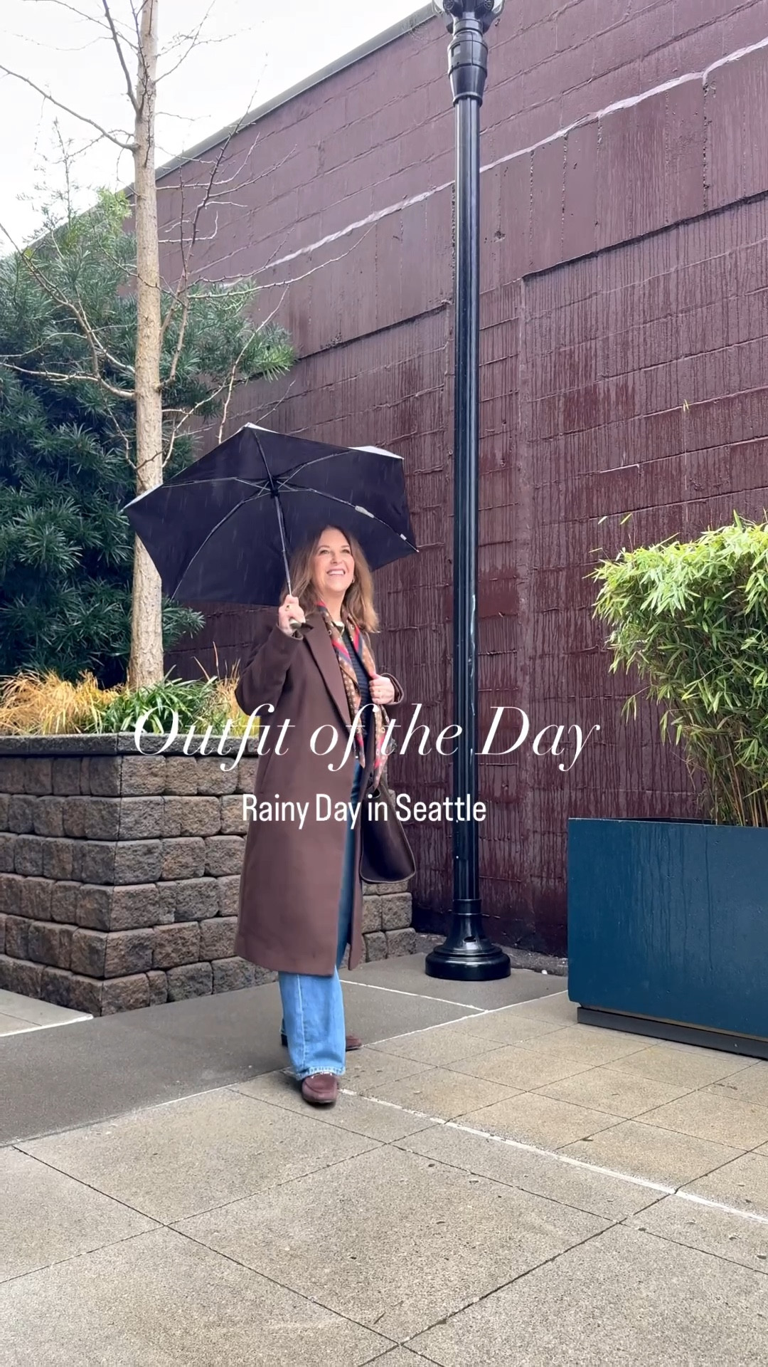 My Friday outfit of the day. 

I'm at a photoshoot, and it's pouring down rain.  All I can do is laugh and have some fun with it.  😆

This outfit is about wearing straight jeans. A classic style but trending this season.  

I'm also wearing a lightweight sweater, a silk scarf, a wool coat, slim sneakers, and a suede tote. Yes, I wear suede in the rain. 

Plus, I'm carrying an umbrella, which I rarely do. Do you carry an umbrella in the rain? 

#LTKOver40 #LTKootd #LTKdayinmylife