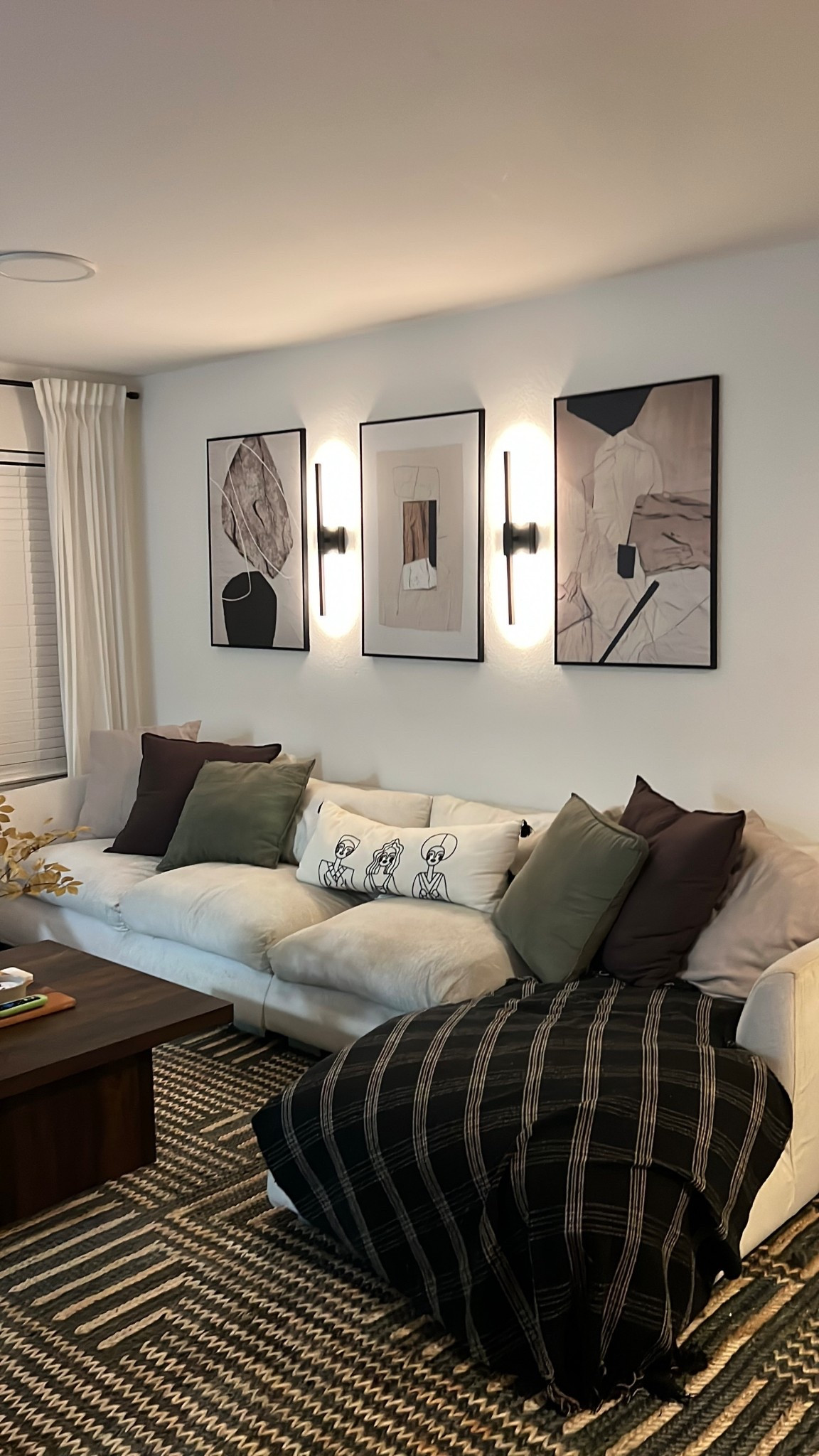 New wall Sconces 😍 living room is slowly starting to come together. 

Living room decor, organic modern

#LTKHome #LTKCyberWeek