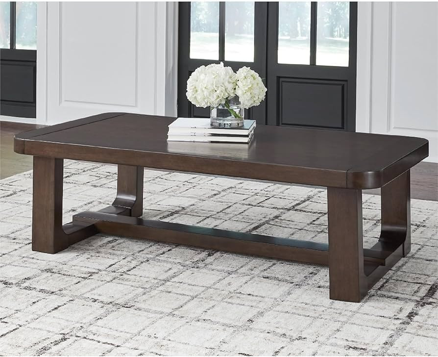 Signature Design by Ashley Breckington Modern Coffee Table with Trestle Base, Dark Brown | Amazon (US)