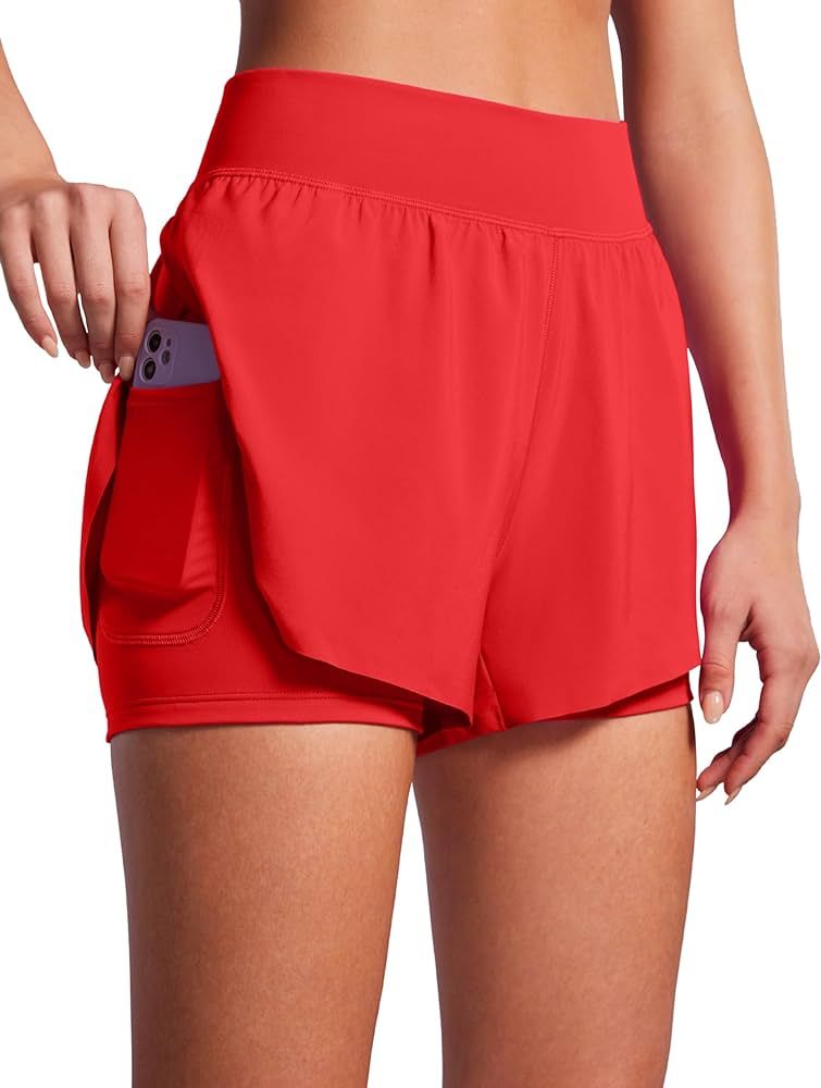 CRZ YOGA 2 in 1 Dolphin Running Shorts for Women High Waisted Gym Workot Athletic Tennis Shorts w... | Amazon (US)