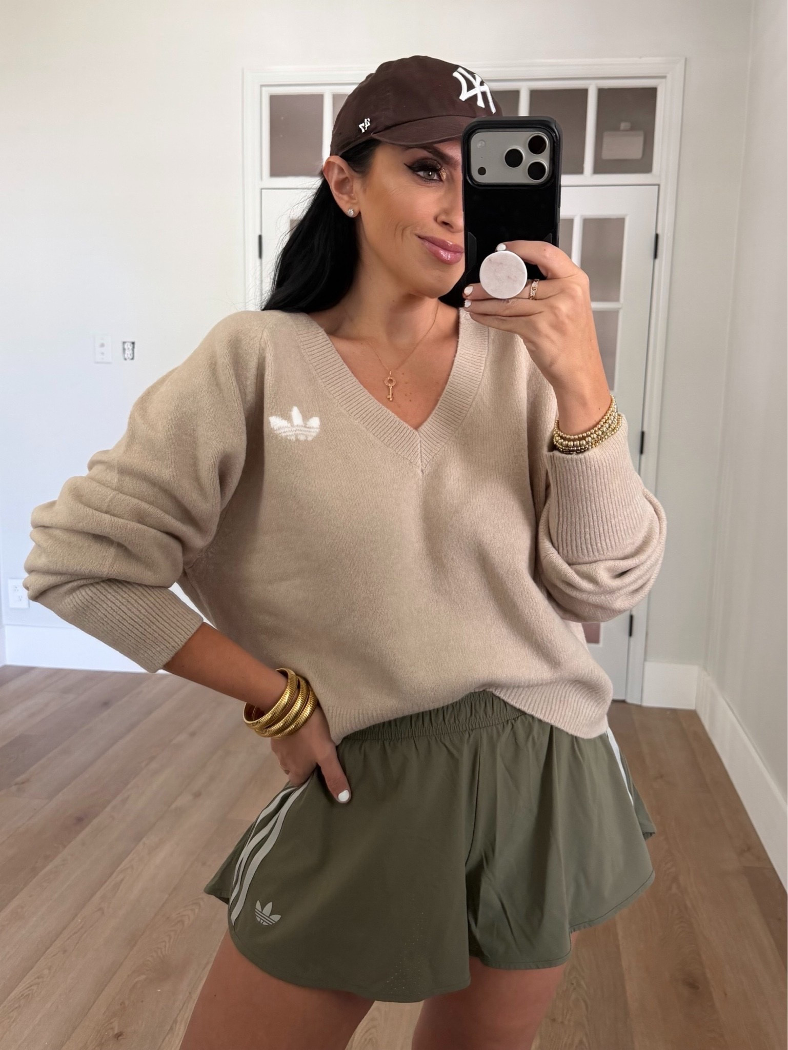 Adidas essentials knit vneck sweatshirt  wearing size medium.  adidas Originals Sport Shorts.