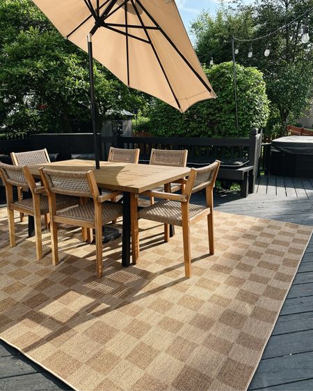 Amazing checkered outdoor rug from boutique rugs! I’m completely obsessed! #ltkpatio #outdoor #patio 

#LTKHome #LTKSeasonal
