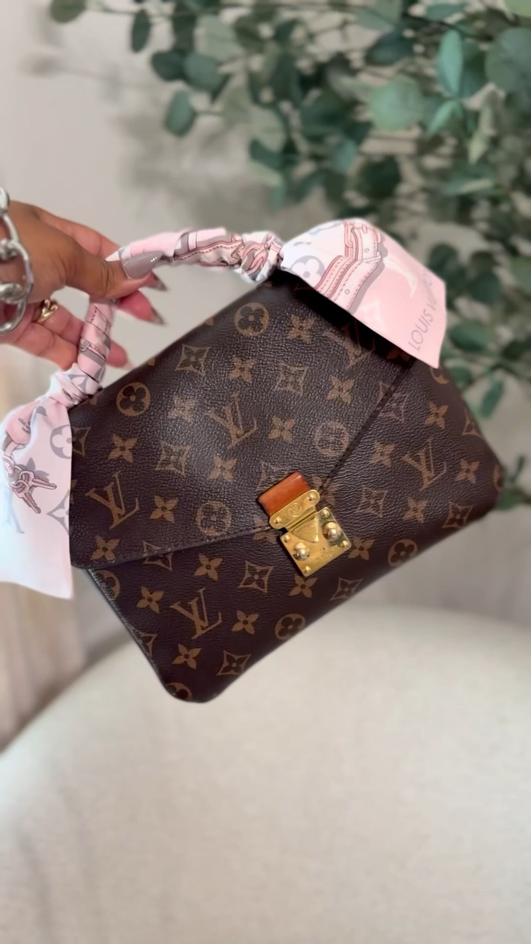 #fashionphilepartner . I snagged this Louis Vuitton bandeau@Fashionphile  to add to the top handle of my Pochette Métis. Tagging similar styles below and some more of my Louis Vuitton favorites. #fashionphilefinds #fashionphile #ad

#LTKgrwm #LTKvlog