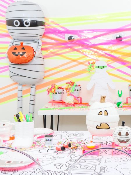 Cute Halloween mummy themed party! Fun giant mummy backdrop with balloons & a piñata! Activity based mummy themed coloring tablecloth . #mummyparty #mummyhalloweenparty #kidshalloweenparties #kidshalloween #halloweenpartyideas #toocutetospook

#LTKkids #LTKHalloween #LTKparties