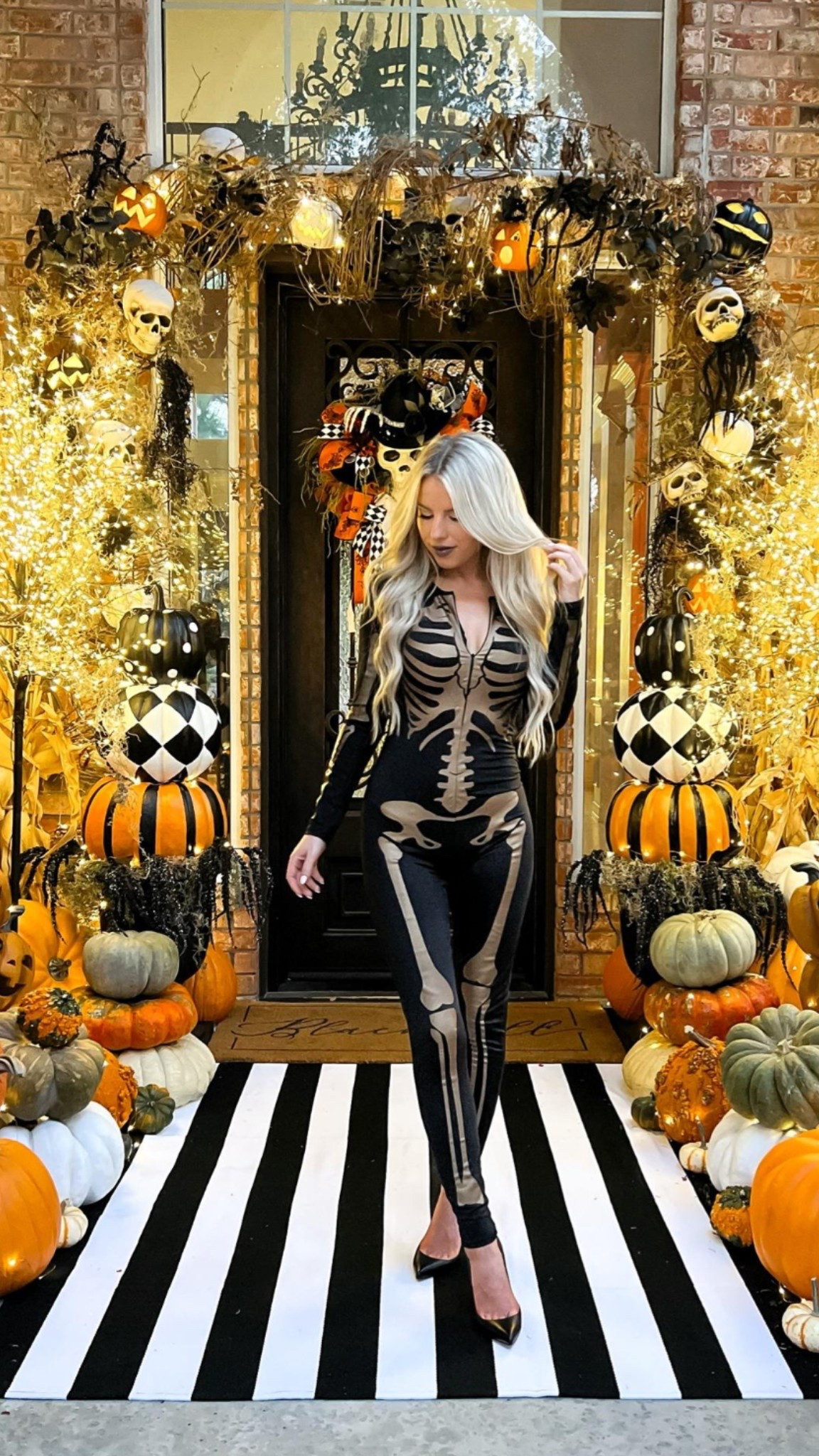Skeleton costume. Skeleton jumpsuit. Black and white front porch rug 