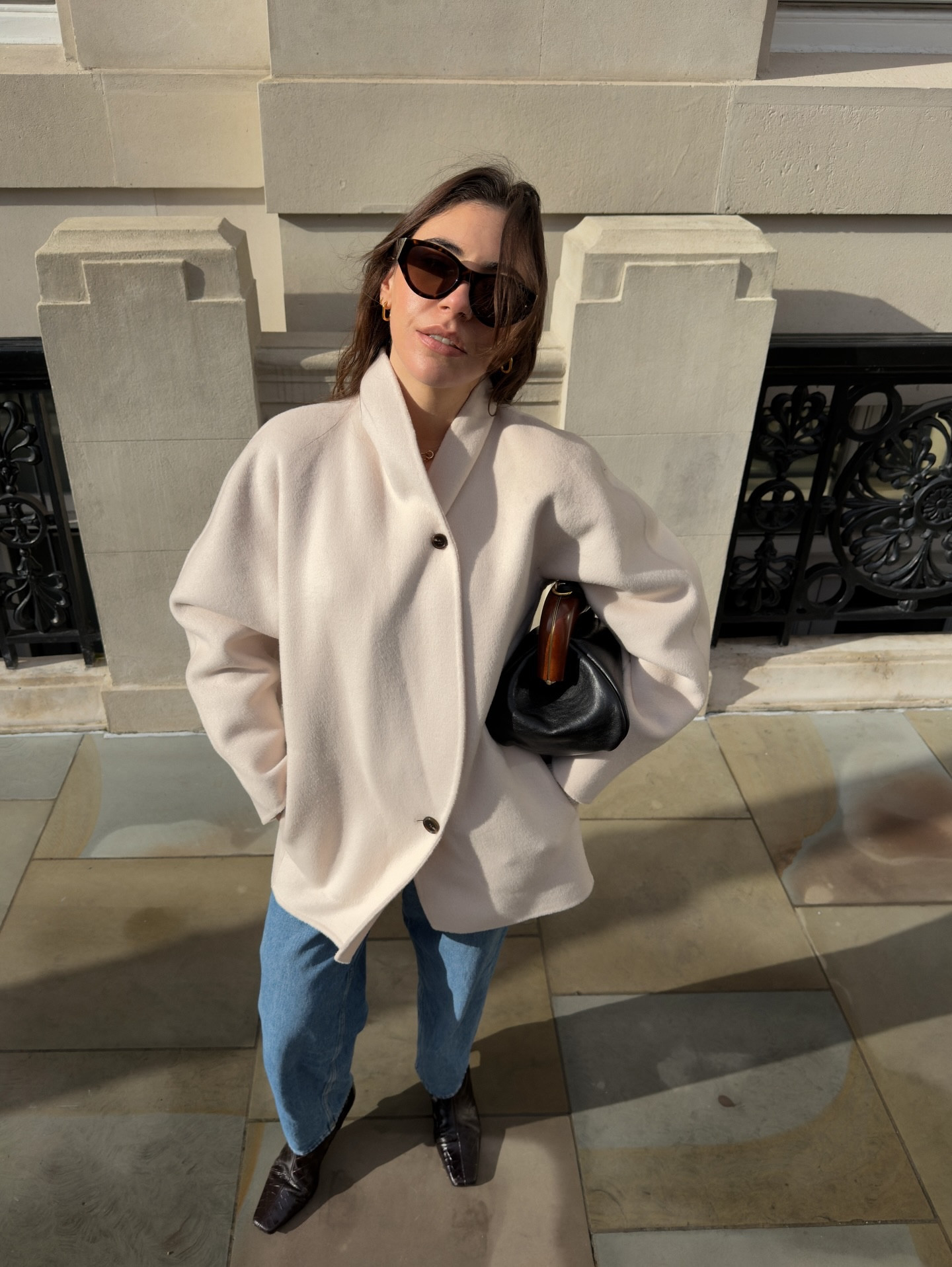 Soft tailoring, warm neutrals & a bag worth building an outfit around ☁️

This is how I style a minimal chic London look:
• oversized cream coat @cos 
• barrel leg vintage-wash denim
• brown details & sculptural bag @sportmax

• gold jewellery @astridandmiyu 

Effortless, but intentional.

Minimal doesn’t mean boring, it’s about texture, proportion & investment pieces that elevate everyday outfits 🤍
#ootd #fitcheck #fashioncontentcreator #minimalchic #pinterestoutfit

#LTKootd #LTKU #LTKPetite