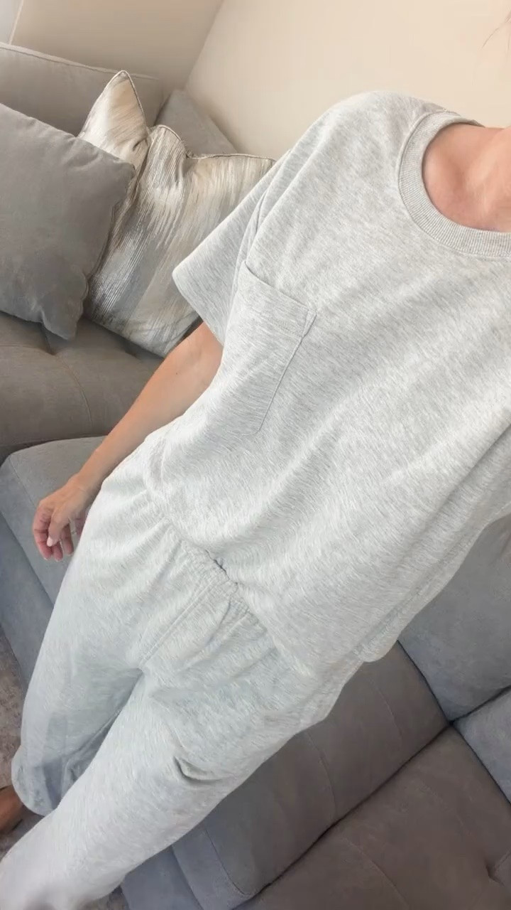 This soft gray matching set is exactly what I want for slow mornings, errands and travel days. The relaxed pocket tee and easy drawstring pants are comfortable without feeling like pajamas.

gray matching set, lounge set, casual matching set, travel outfit, comfy outfit, drawstring pants, pocket tee, everyday casual style, airport outfit, fall loungewear, matching set outfit, HauteandHumid

#LTKootd #LTKSeasonal #LTKOver40