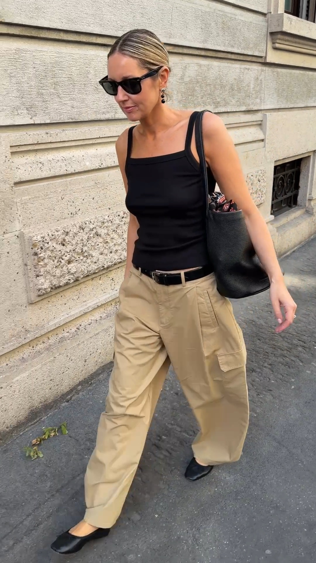 Wandering through Milan 

black square neck tank, black leather belt, khaki cargo trousers, wide leg tailored trousers, black leather flats, black leather tote bag, black square sunglasses, street style, European street style, casual chic outfit, off duty style, elevated basics, quiet luxury, neutral color palette, monochrome styling, ltkstyletip, ltkseasonal, ltkfindsunder100, ltkitbag

#LTKFashionMonth #LTKluxury #LTKstyletip
