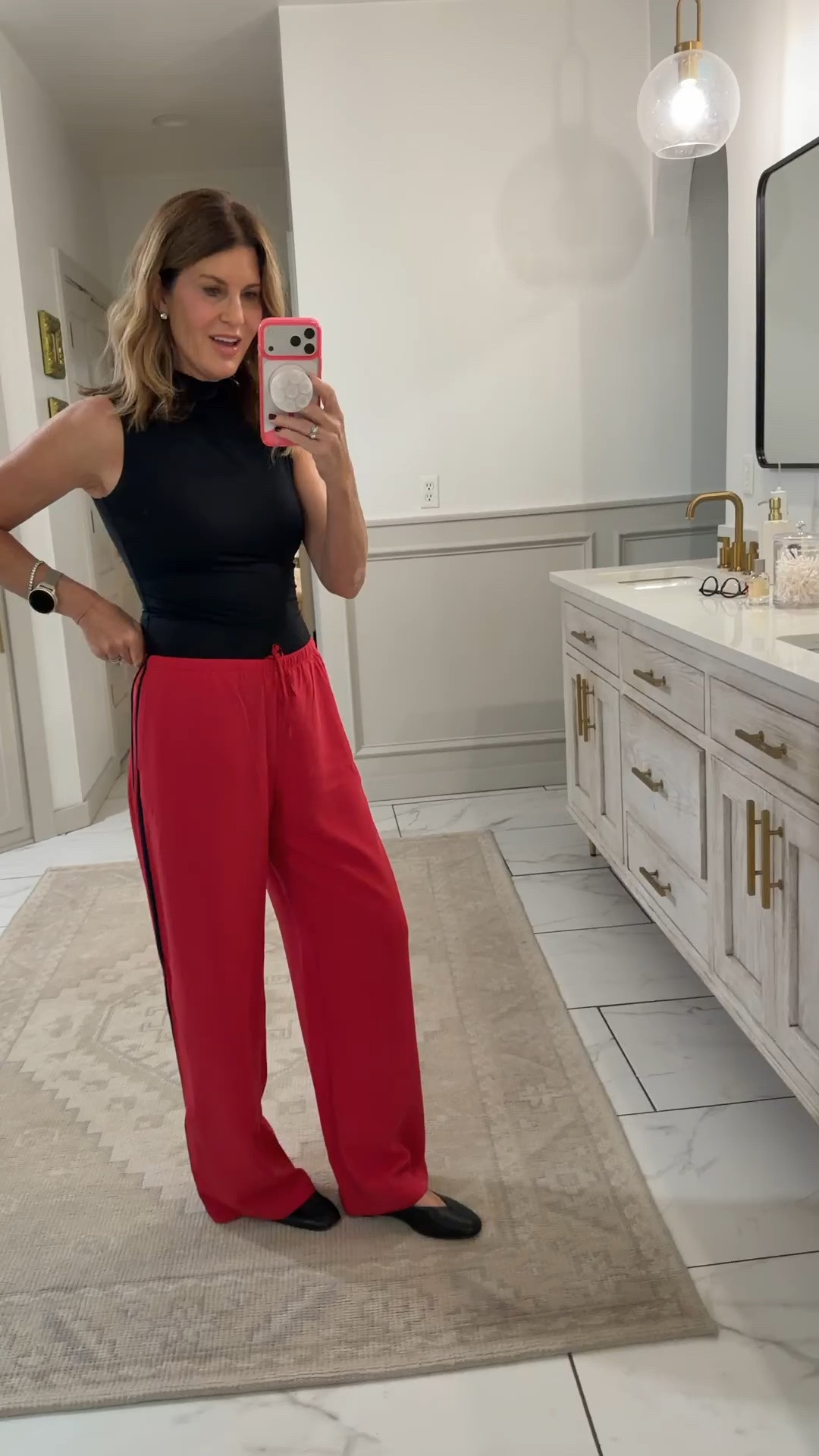 Wearing a size small regular and medium top