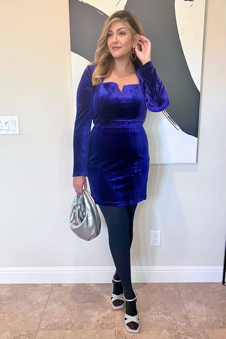 This velvet dr as is the perfect winter wedding guest dress that looks amazing on us midsize ladies!  Paired with silver glitter block heel sandals, this gorgeous silver evening bag from Anthropologie, and these fleece lined tights from Nordstrom.
Wearing a large
Follow me for more stylish feminine midsize style and looks 

#adelynrae #AdelynRaePartner #ARGIRL
#ad #gifted #midsizedstyle #stylishmoms #trendymom #stylishmama #holidaywear #momswithstyle #lookbooks #mommystyle #stylishmom #holidayfashion #styletip #holidayoutfit #fashionmom #midsizestyle #momfashion #holidaystyle #styleguide #styleinspo #ltkholidaystyle
#weddinggueststyle #cocktaildress #christmas #reddress #holidayphotos #weddingguestdress

Christmas outfits / thanksgiving outfit / wedding guest dress / cocktail dress / matching family photo  / fall outfit / 
Evening dress  / size 12  / Christmas concert / winter concert / winter formal / winter recital/  midsize outfits /
Midsize mom

#LTKmidsize #LTKwedding #LTKparties