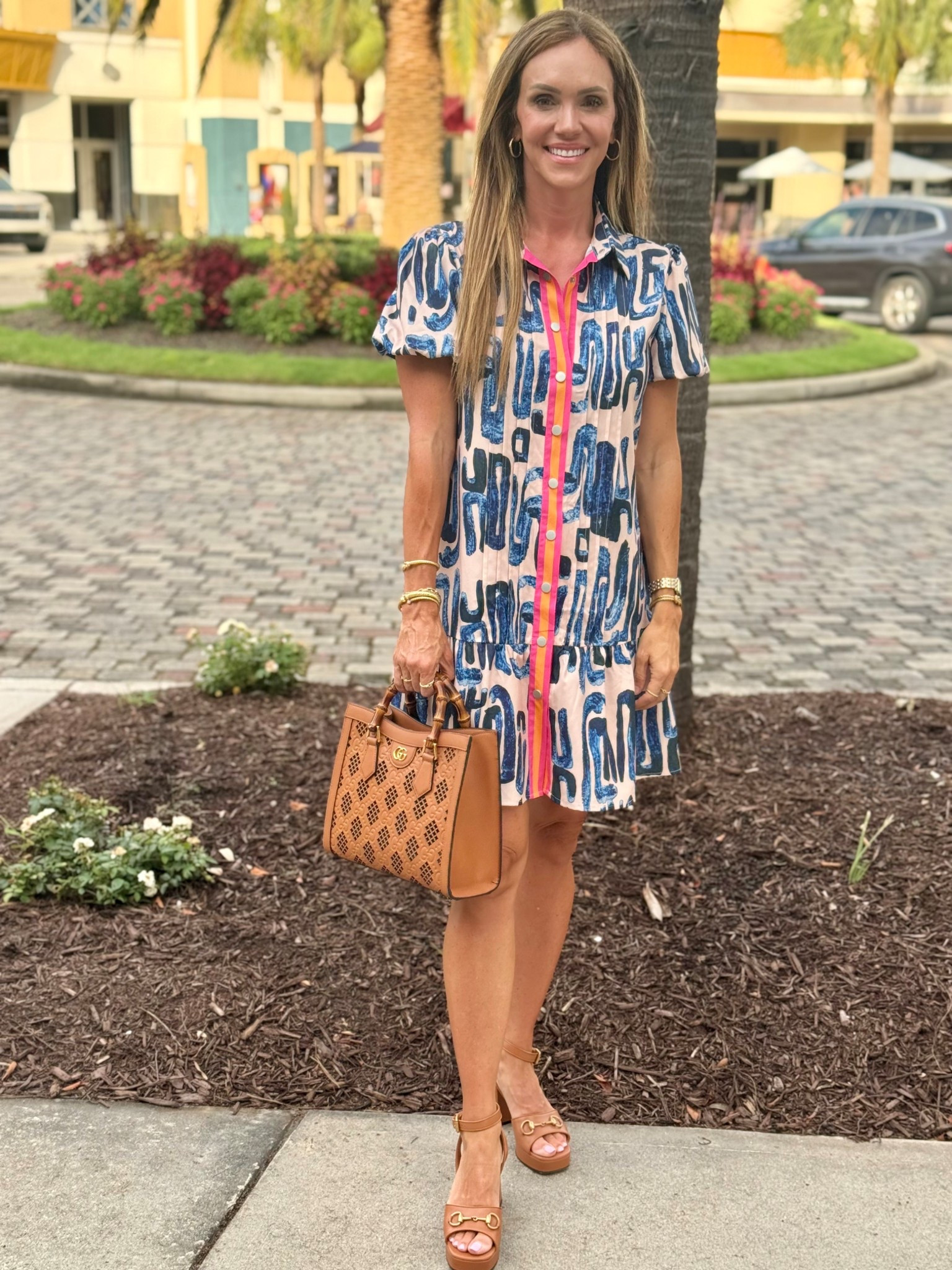 Love the pop of color with the orange & pink strip on this dress. So easy to dress up or wear casual. 

#LTKOver40 #LTKStyleTip #LTKShoeCrush