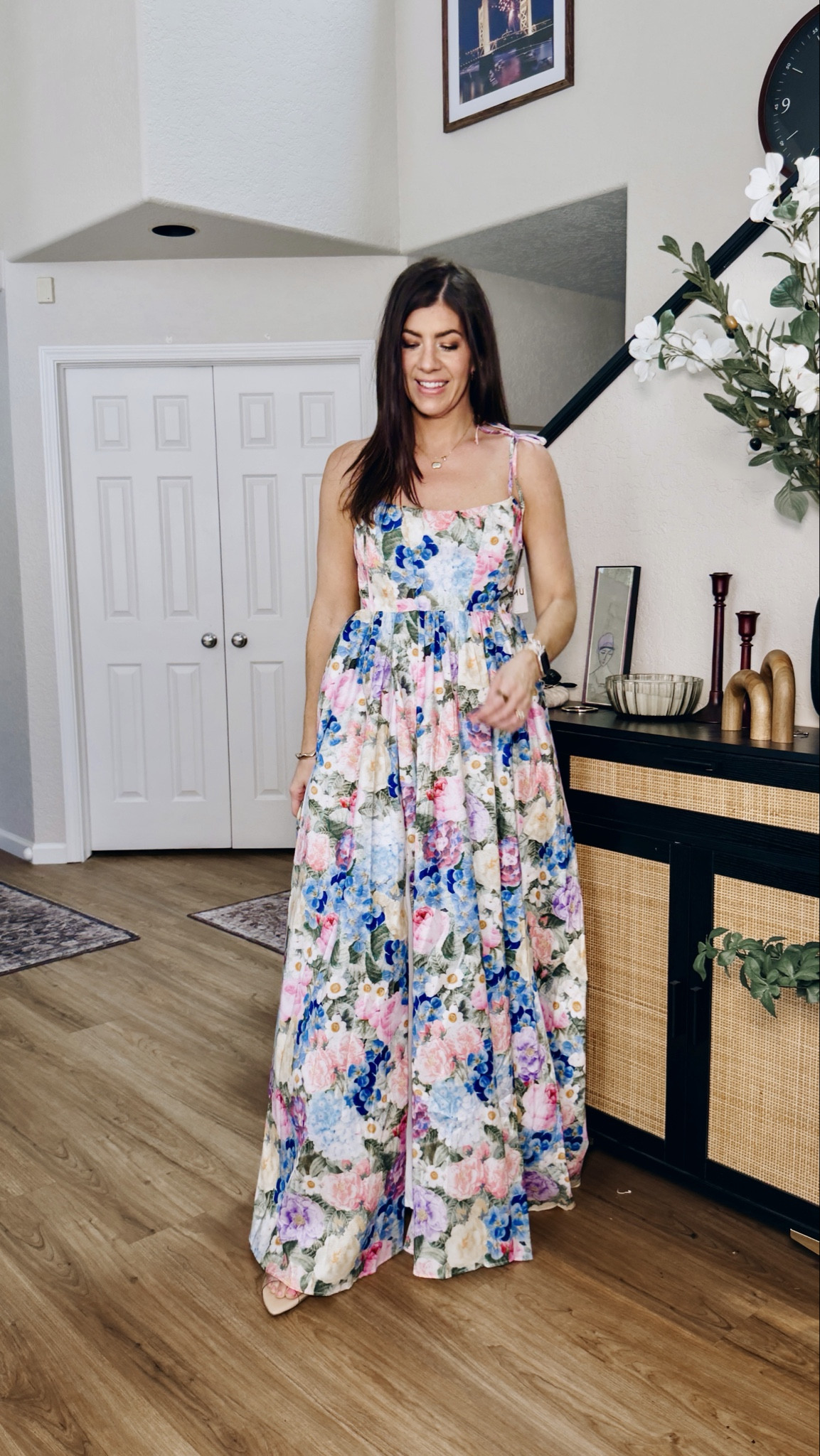 In a medium floral bustier dress 

#LTKTall #LTKWedding #LTKMidsize