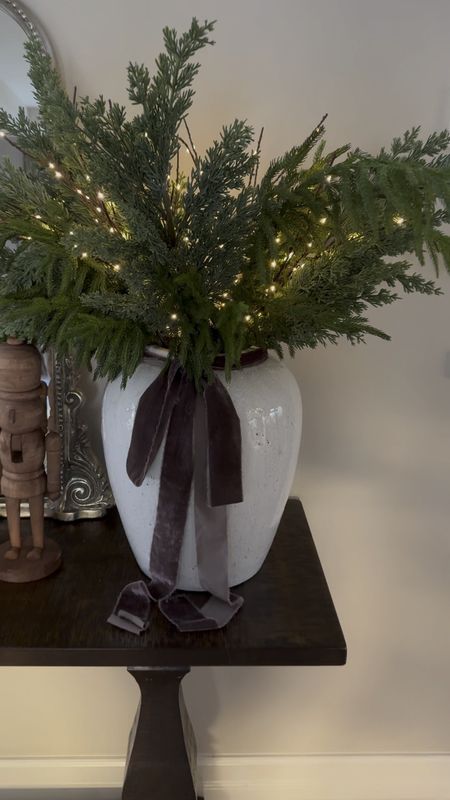 I’m loving mixed greenery for this Christmas, and I absolutely love how this arrangement turned out!

Arhaus vase, velvet ribbon, Norfolk pine stems, pine stems, battery operated branch, lit branch, entryway styling, console table styling, Christmas decor, holiday decorating, garland 



#LTKVideo #LTKhome #LTKHoliday