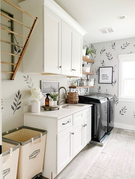 Laundry room makeover we did a few years ago is still such a great one! Every detail from our pottery barn drying rack to our canvas laundry bins from Amazon makes me love this space more!

#LTKstyletip #LTKunder100 #LTKhome